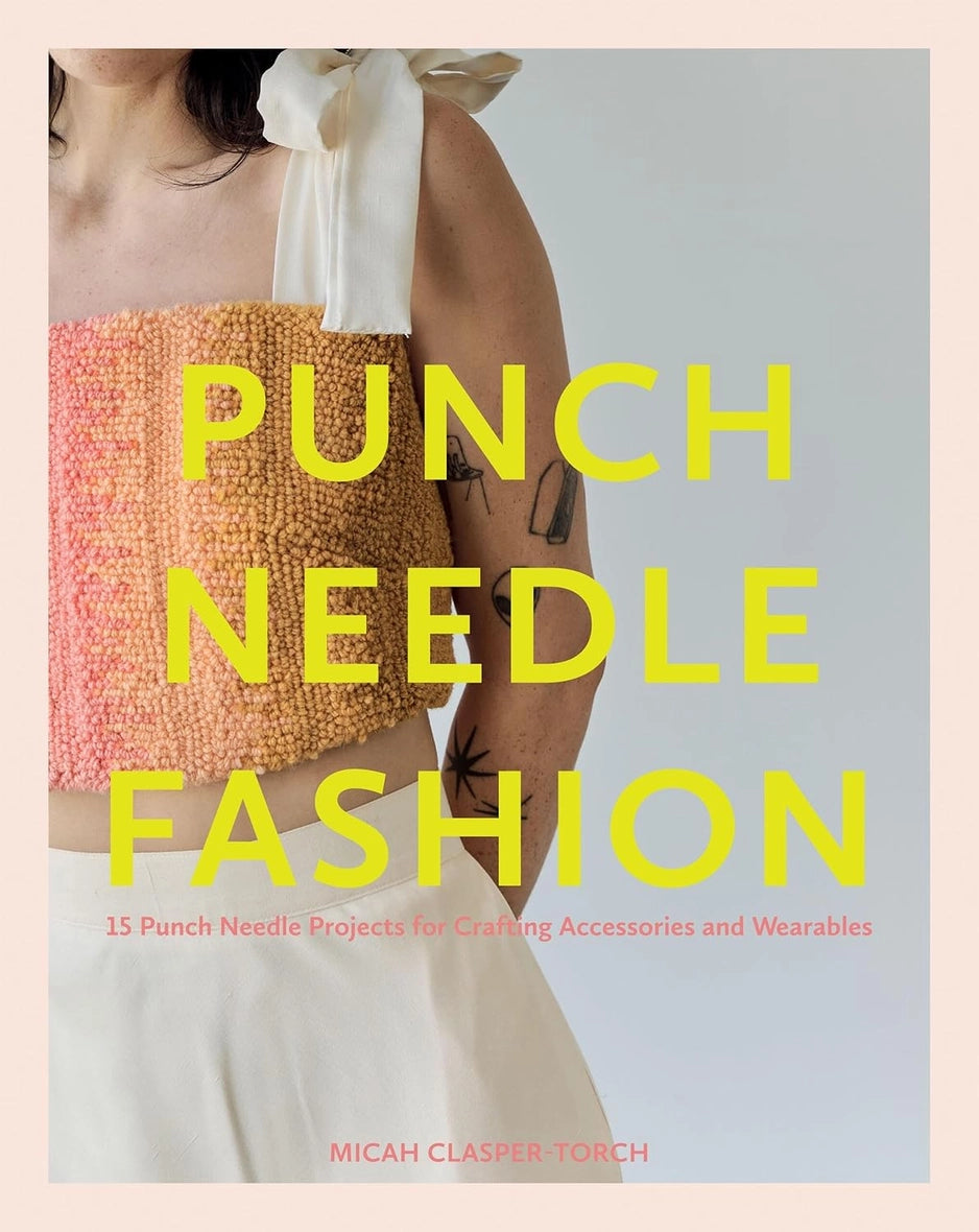 Book cover of 'Punch Needle Fashion' with a person wearing a colorful top against a light gray background.