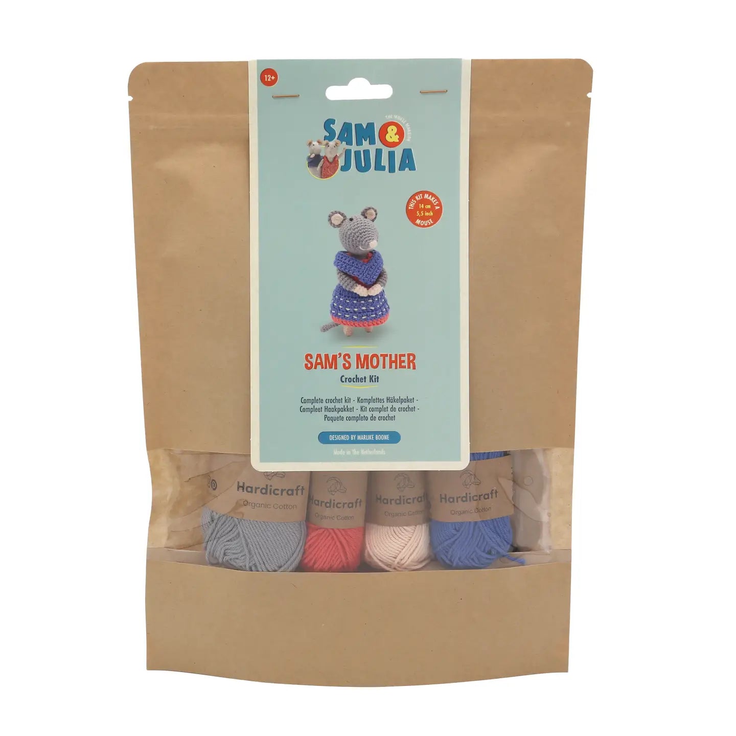 Crochet kit packaging with yarn balls and a label on a white background