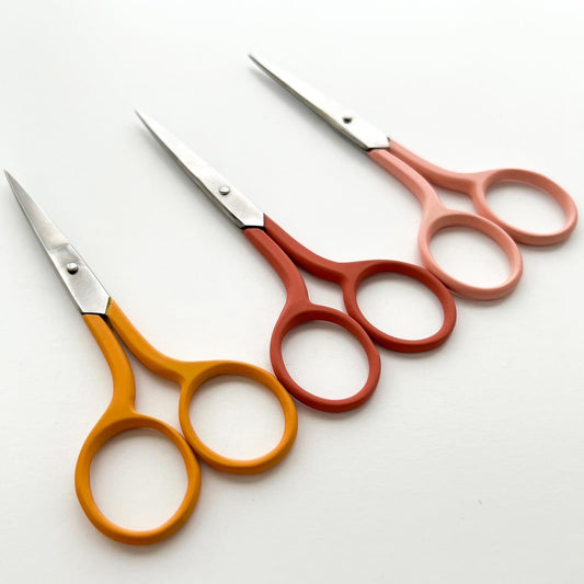 Multi colored embroidery scissors